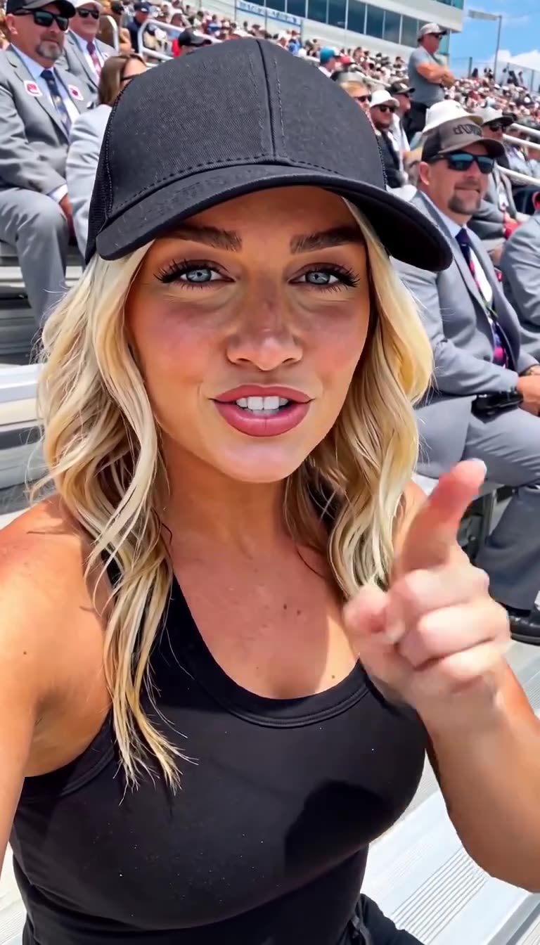 Chloe gesturing with her finger toward the lens while delivering her playful question to viewers.