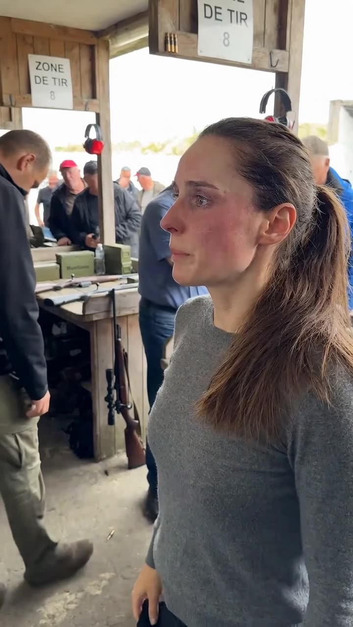 Camille removes her blindfold to confront her challenger on the range.