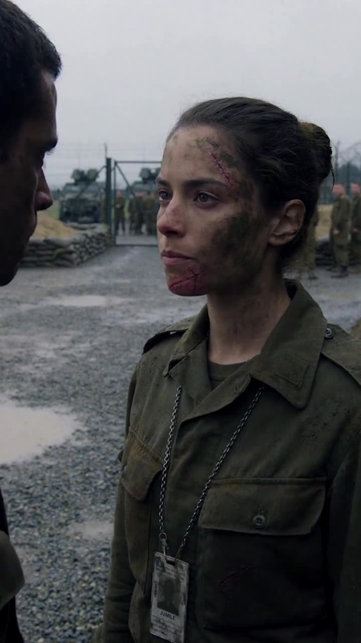 Close-up of Camille delivering a calm, decisive rebuke to her superior.