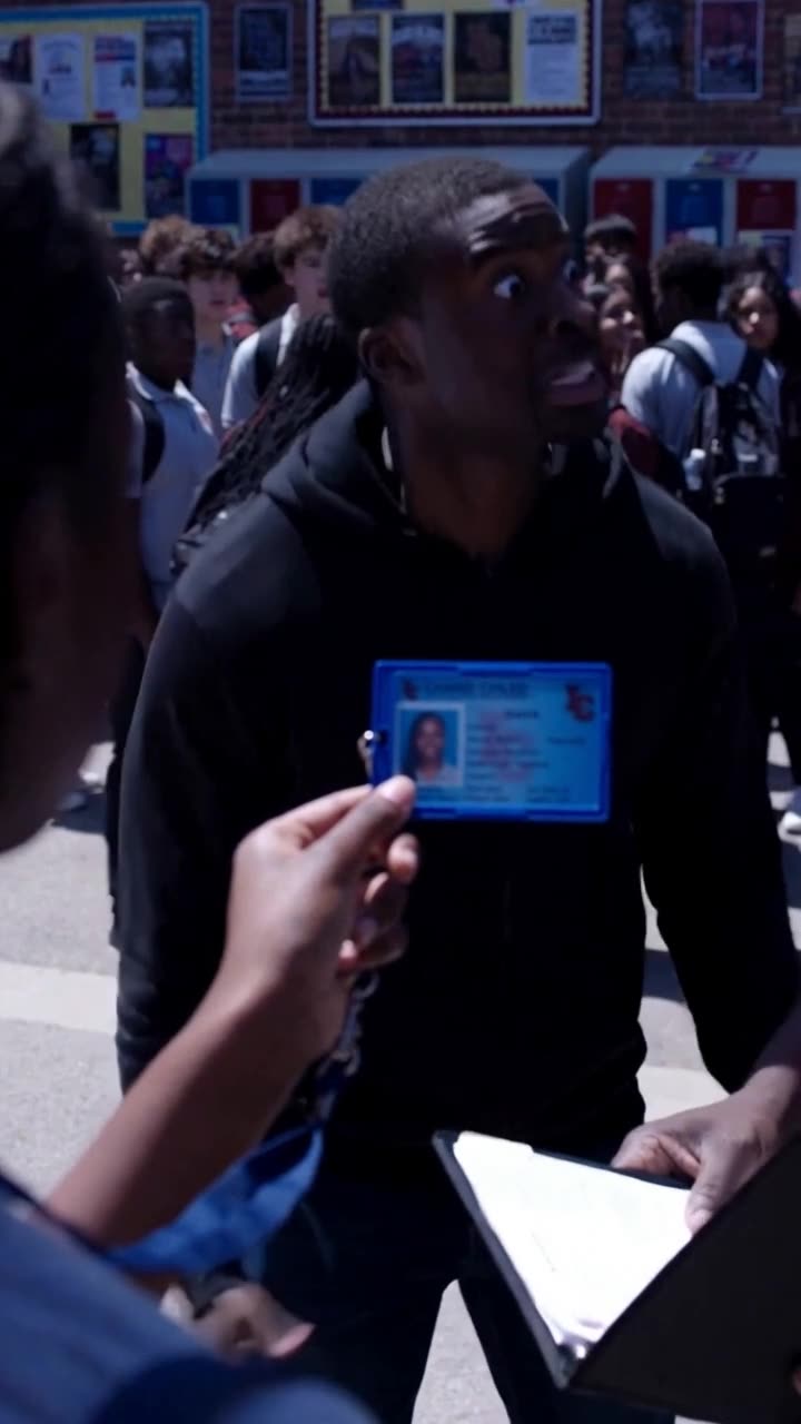 Chad recoiling in shock and disbelief as Maya displays the credential.