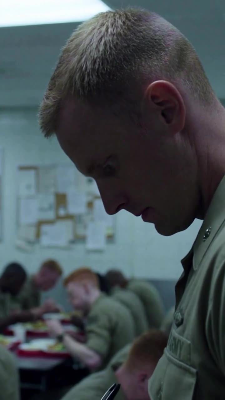 Close-up of Sergeant Brad lowering his eyes in stunned defeat