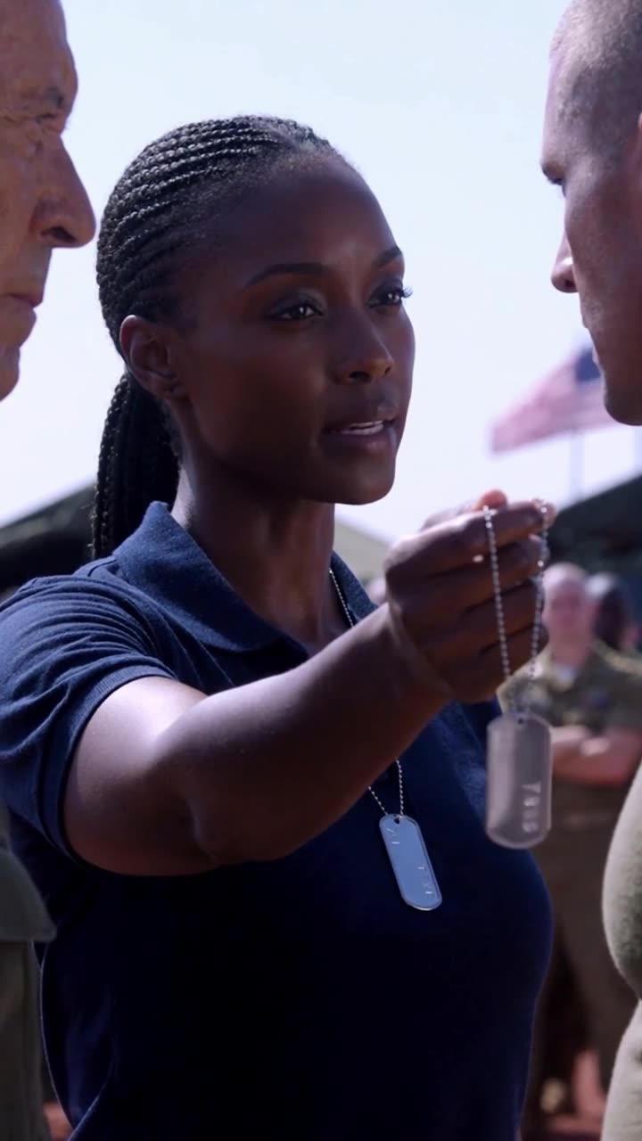 Maya thrusts the official identification tags forward, delivering a chilling ultimatum to Brett.