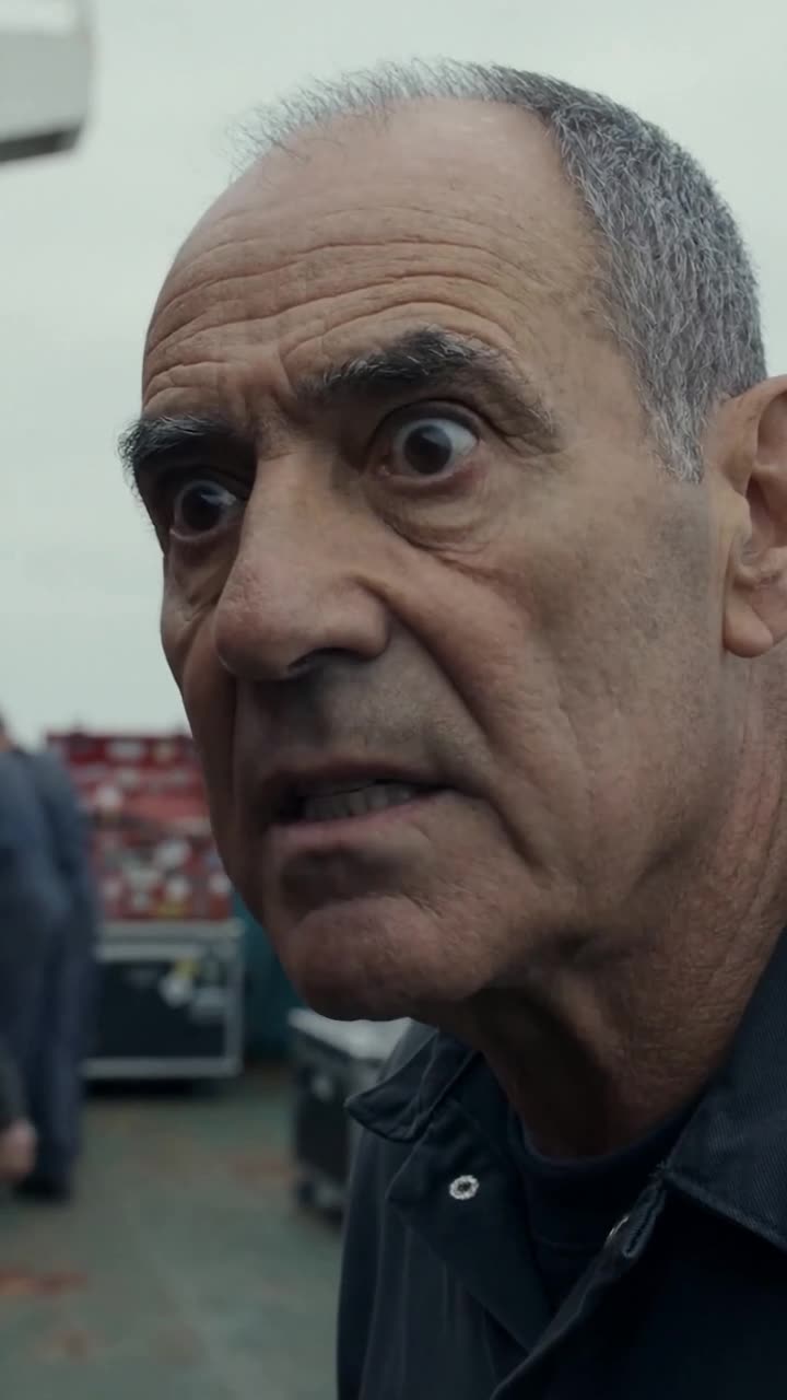 Thomas stares wide-eyed in absolute terror after hearing an answer from within the sealed bulkhead.