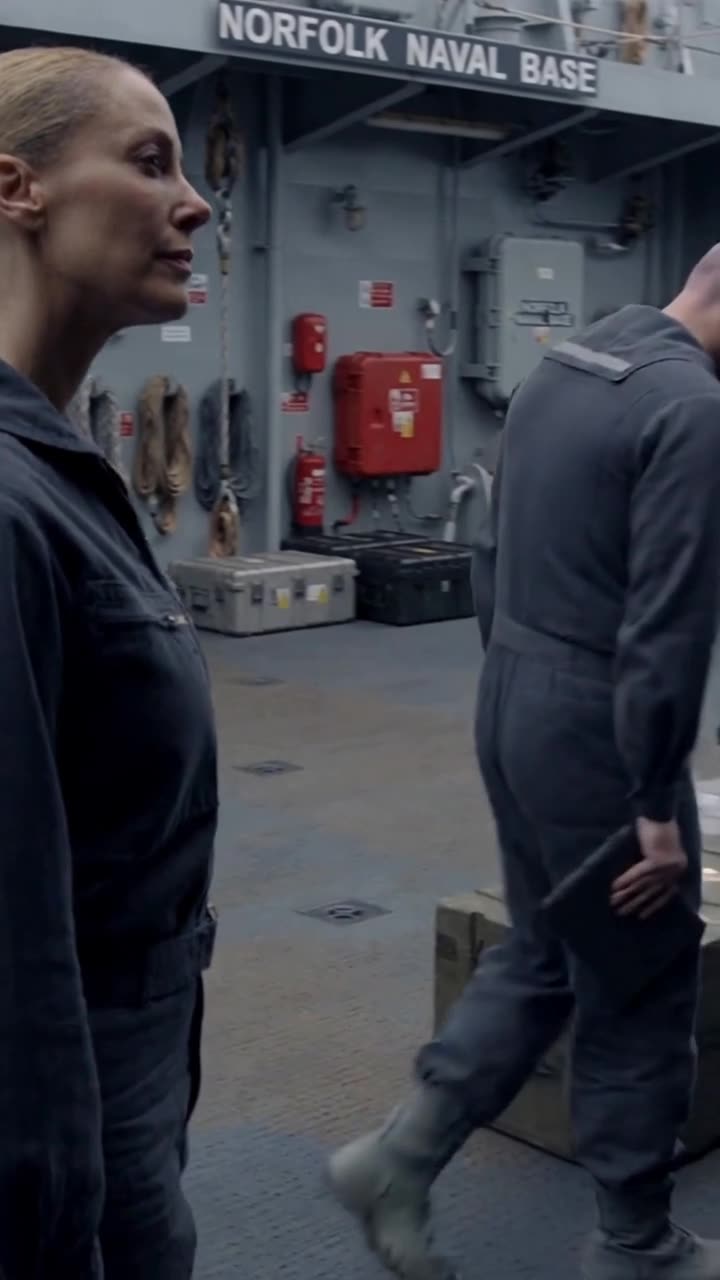 A defeated Robert trudges away along the Norfolk deck while Maya oversees the shift in command.