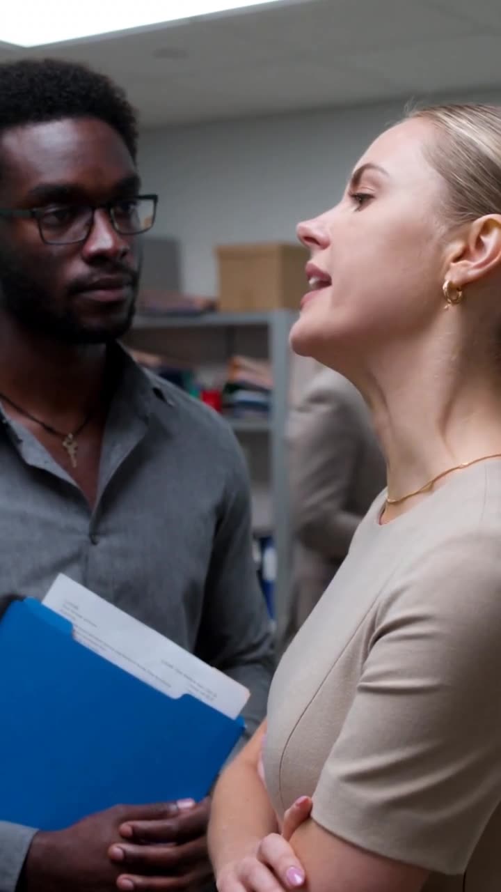Chloe sneers as she looks down on Lucas with crossed arms