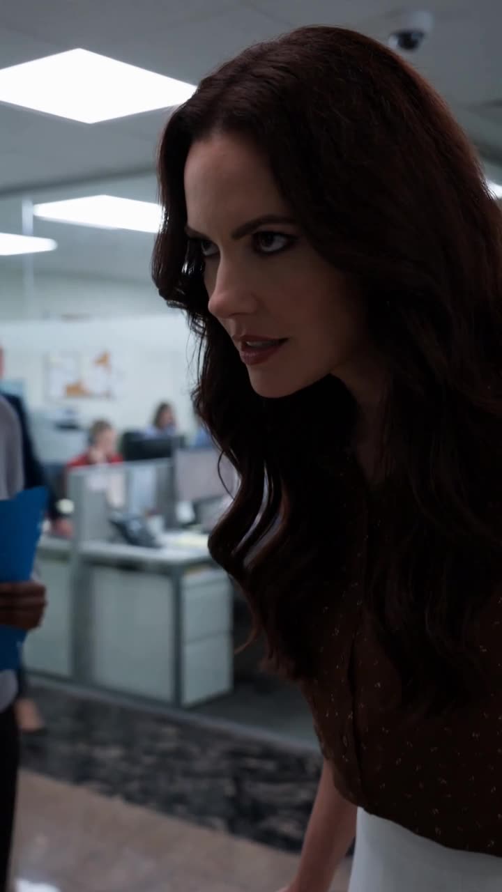 Vanessa sneers closely at Maya before dropping the laptop
