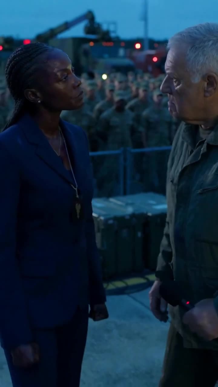 Captain Vance stares down Colonel Garrett before assembled troops
