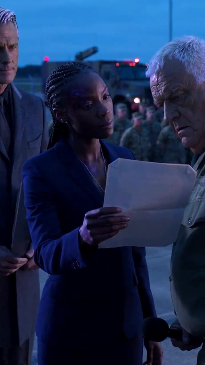 Thomas stares in shock as Maya presents the executive order
