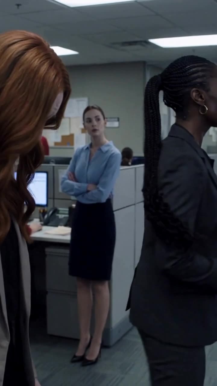Maya turns to walk away after delivering the termination order as Chloe stands humiliated
