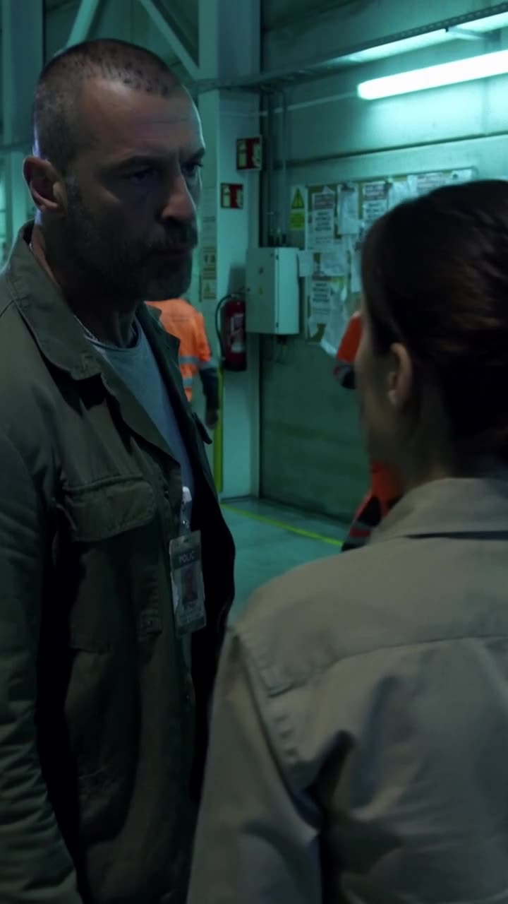 Marc turns to Élodie and delivers the order to lock down the entire airfield facility.