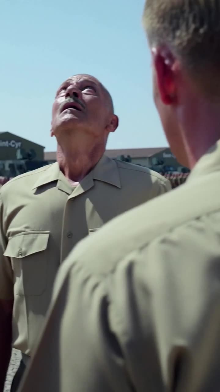 A stunned military commander looking up in utter disbelief on the parade grounds
