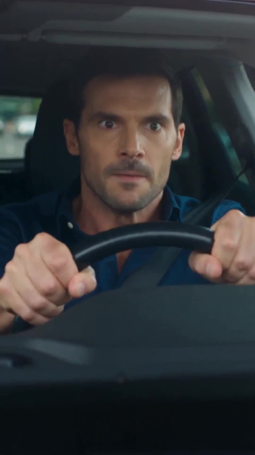 A desperate father gripping the steering wheel while speeding through traffic.