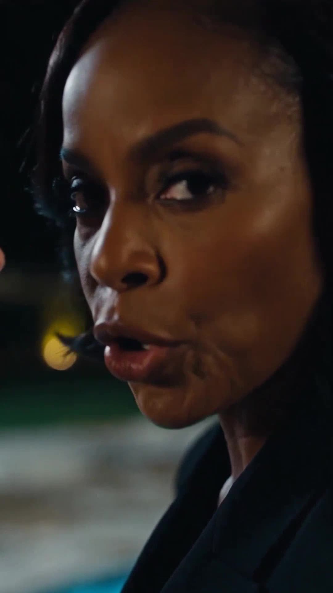 Elena glares with fierce protective authority as she intervenes to save her daughter